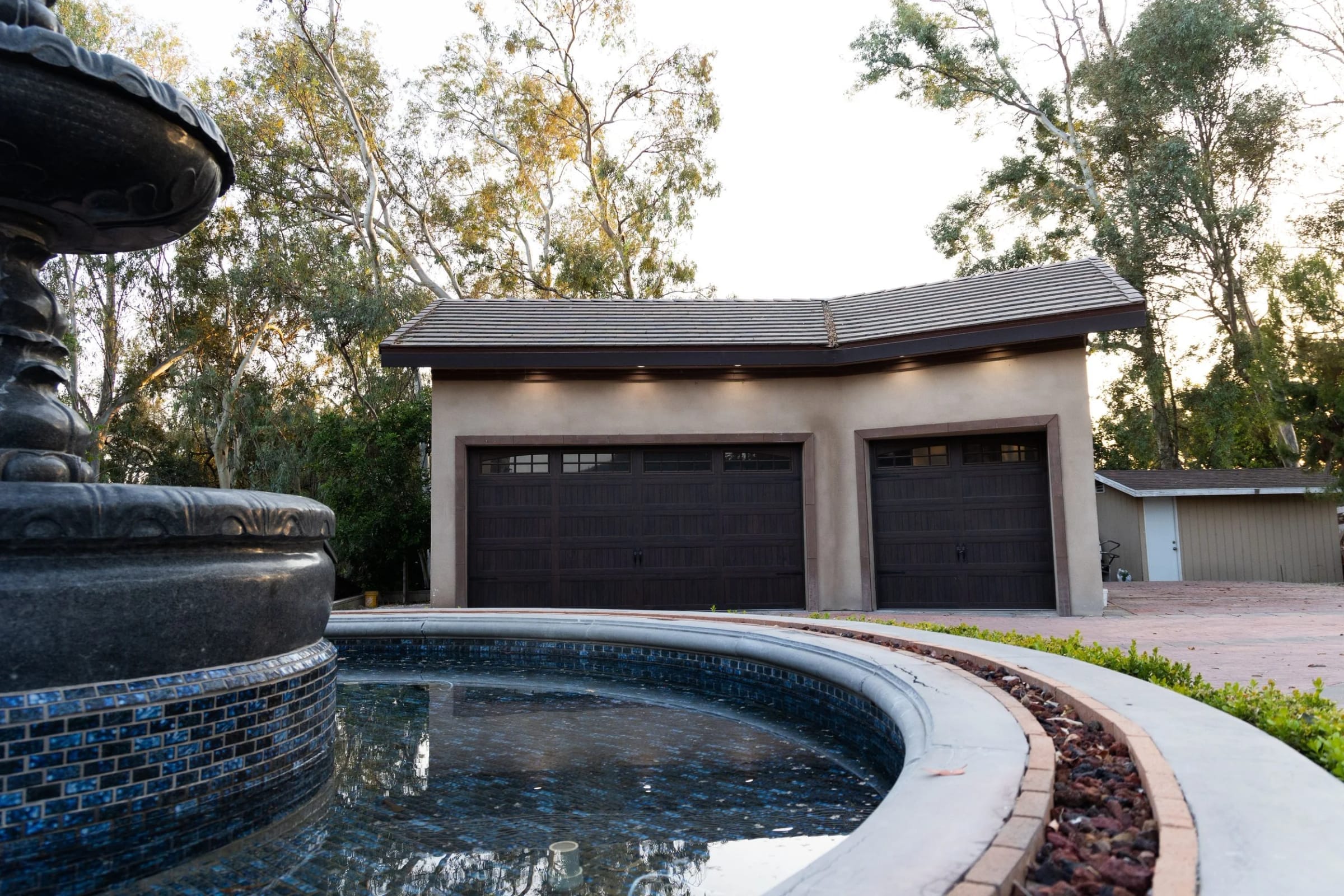 Garage court and fountain